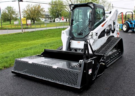 auto rake skid steer|best skid steer power rake.